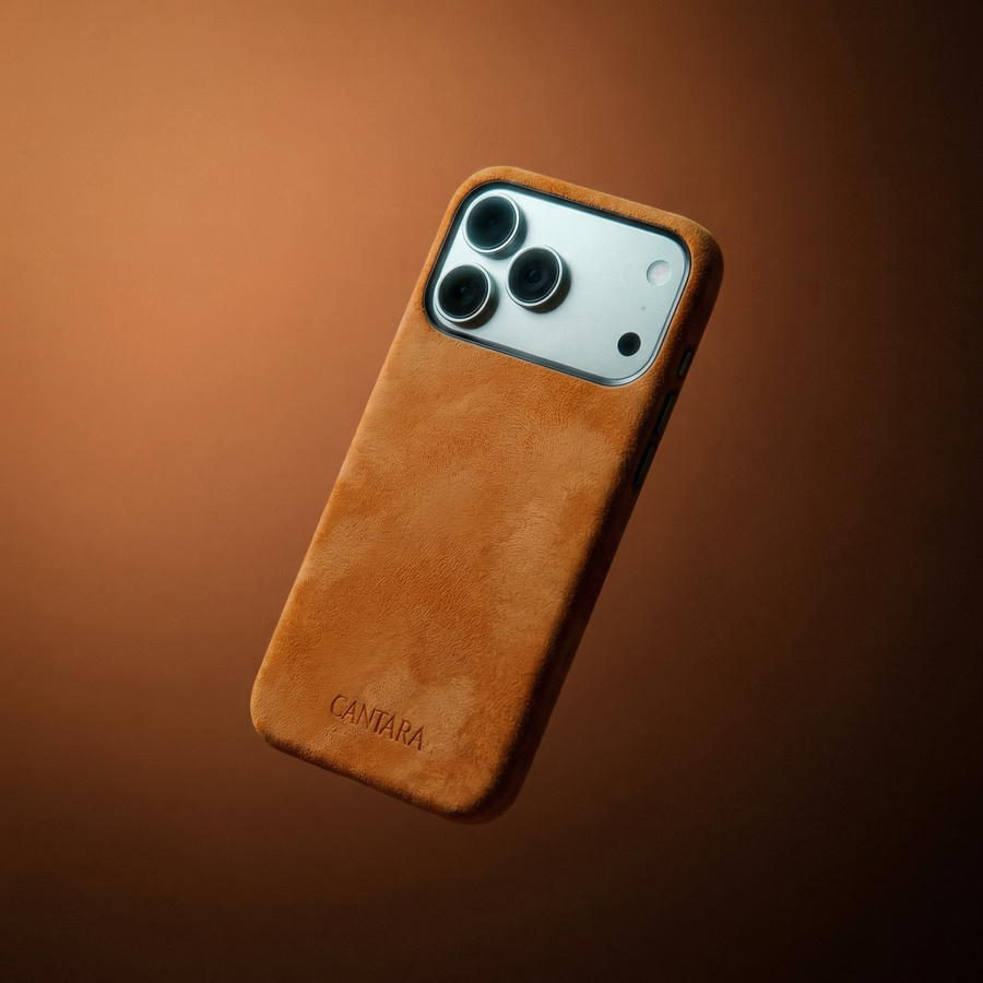 Cantara Alcantara iPhone 17 Pro case in Arancio Corsa, front view